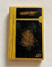 Vintage S.T. Dupont lighter with black Laque de Chine and gold-tone finish. picture