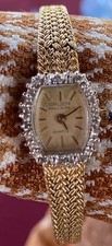 vintage Gruen gold tone  ladies wristwatch with diamond accent / Bezel picture