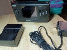 Sega Genesis Nomad + battery pack, tested picture