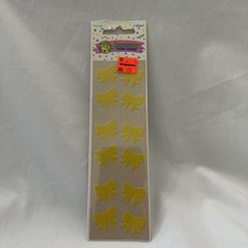 Vintage 1980s Sandylion Fuzzy Yellow Bows Sticker Strip Pack NOS Brown Back picture