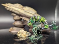 Charging armored orc champion d&d miniature w/axe picture