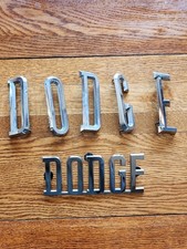 1964-1970 DODGE A100 A108 VAN TRUCK FRONT GRILLE LETTERS EMBLEM SET MOPAR picture