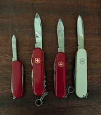 3 Vintage Wenger Delemont Swiss Army Knife and one victorinox white used picture