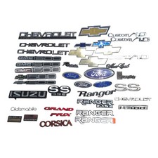 38 Emblem Lot of Used Car Emblems Ford Chevy GMC Camaro SS Isuzu Ranger & More picture