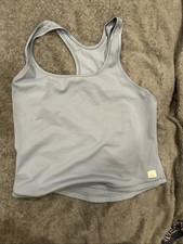 This is a Vuori Feather Slim Racerback Tank Top in a light blue color. picture