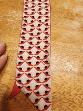 Fendi 100% silk monster twilly scarf featuring a red, white, and black geometric picture