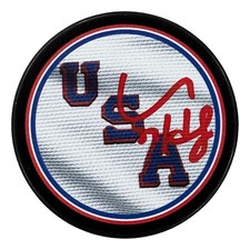 Connor Hellebyuck Signed USA Hockey Logo Puck Fanatics picture