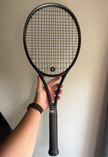 Wilson RF 01 professionally strung, with 2 RF dampeners + overgrip, used 1 time picture
