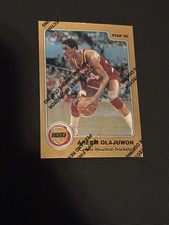 Star 1984-85 Star '85 Akeem Olajuwon Reprint #237 w/protective coating picture