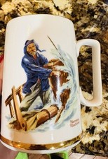 Norman Rockwell Collector 8 Plates & 4 Mugs @ $9 each. Excellent Condition picture