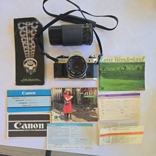 Vintage Canon AE-1 Program Film Camera w/2 non Canon lenses, OG manuals picture