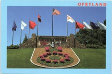 Vintage Postcard Opryland Nashville Tennessee Flags Flowers Sculpture 1995 picture
