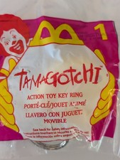 McDonald's 1997 TAMAGOTCHI Action Toy￼ Key Ring #1 Sealed Package Yellow picture