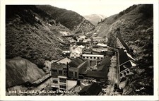 DOWNTOWN BUILDINGS burke id real photo postcard rppc idaho mining birdseye view picture