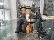 LAUREL AND HARDY SITTING ON THE BENCH CERAMIC FIGURINE picture