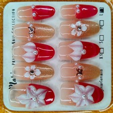 SkyMarie Handmade Large Red & Gold 3D Flower Bow Press-On Nails | Pearls picture