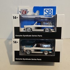M2 Machines Squarebody Syndicate 2026 1975 GMC Jimmy Sierra Lot Of 2 picture
