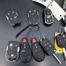 USED LOT OF OEM KEY FOBS GM CHRYSLER FORD picture