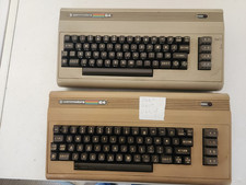 VINTAGE LOT OF 2 COMMODORE 64 COMPUTERS FOR PARTS OR REPAIR picture