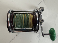 Vintage Maroon Penn Monofil 26 Conventional Reel w/ Green Handle picture