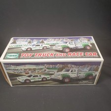Vintage 2011 Hess Toy Truck and Race Car Set Flatbed Hauler New In Box NIB picture