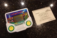 Vintage CAPTAIN PLANET + BOOK  by  TIGER Handheld Electronic LCD  Video game D7 picture
