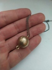 Vintage mid 20th century 🧲 magnetic gold coloured metal Pendant. One peice only picture