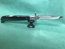 Unique folding pocket knife with 440C steel blade. picture