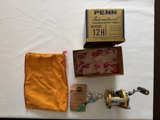 Vintage PENN International 12H Tournament Reel Gold USA w/ Original Box & Bag picture