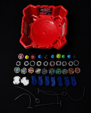 Beyblade lot with all parts to play the game and 9 full bay blades picture