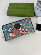 𝙂𝙪𝙘𝙘𝙞 Disney Donald Duck Zip Wallet pairs Donald Duck GG Supreme 647940 picture