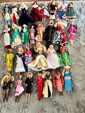 vintage barbies 1990s -80s with stand picture