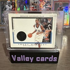2001-02 Fleer Genuine - Genuine Coverage Plus Uniforms Tracy McGrady (MEM) picture