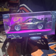 Jada 1:24 Pink Slips 1995 Mazda RX-7 Widebody Black/Red Dragon picture