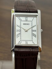 Vintage Refurbished Seiko Slim Quartz Men's Wrist Watch-Roman Dial picture