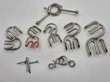 Lot of 8 Metal Brain Teaser Puzzles Hanayama Cast Devil True Genius Roman Arches picture