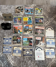 Lot of vintage View-Master viewers and reels, spanning 1950s–1970s production. picture