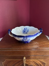 Handled large antique flow blue footed bowl picture
