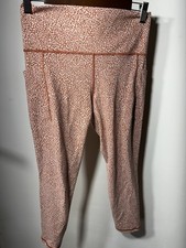 Athleta Salutation Stash Pocket Leggings Ocelot Spot Orange Women’s Sz Medium picture