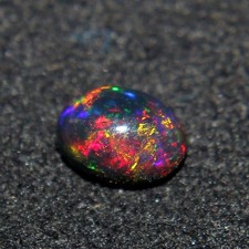 Natural Ethiopian Multi Fire Black Opal Oval Cabochon Loose Gemstone 7x5 mm AAA picture