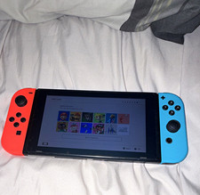 Nintendo Switch Console with Neon Red/Neon Blue Joy-Con Handheld System picture