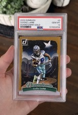 NFL REPACKS… 2025 CEEDEE LAMB GOLD DOWNTOWN PSA 10 EDITION..‼️🔥 picture