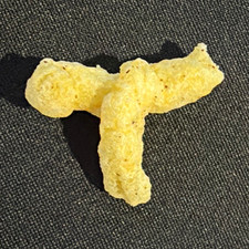 Unique T shaped Cheeto Puff 1/1 piece picture