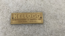 Kellogg Switchboad Antique Telephone Brass Nameplate NOS New Phone Tag picture