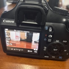 Canon EOS Rebel T3 DSLR Camera Body and battery picture