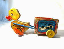 Vintage 1952 Wooden Musical Duck Pull Toy with Wheels Cart picture