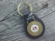 1955-1962 CHEVROLET CORVETTE  ANTIQUE GOLD LEATHER KEY FOB VINTAGE NOS FLAGS picture