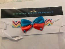 Pet accessory for a small dog with different colors and different designs. picture