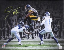 Jaylen Warren Steelers Autographed 16x20 Leaping over Defender Spotlight Photo picture