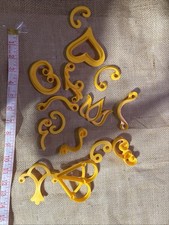 Vtg Yellow Wilton Cake Decorating Tools Pattern Presses (15 Pcs.) 1983 picture